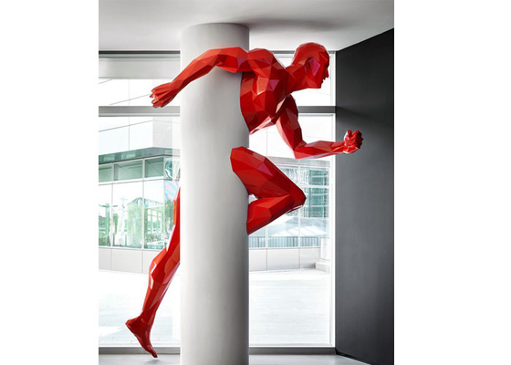 China Large Painted Modern Art Geometric Running Man Fiberglass Sculpture Wall Decoration supplier