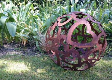 China Large Heart Pattern Corten Steel Sculpture Hollow Sphere Metal Garden Ball supplier