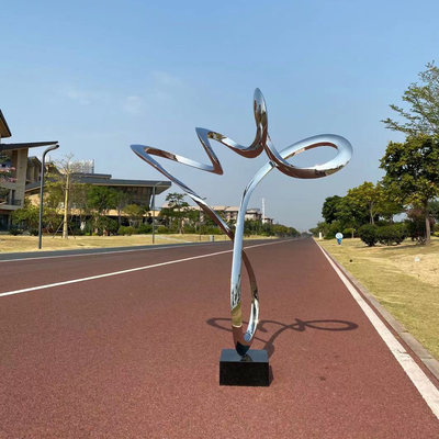 Decorative Stainless Steel Polished Ribbon Sculpture With Black Stone Base
