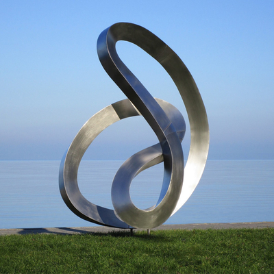 Brushed Stainless Steel Flowing Ribbon Sculpture Contemporary Reflective Art for Luxury Spaces