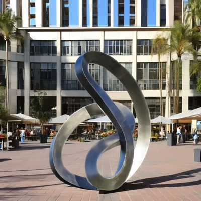 Brushed Stainless Steel Flowing Ribbon Sculpture Contemporary Reflective Art for Luxury Spaces