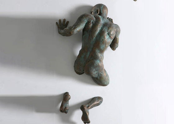 Life Size Patina Cast Bronze Wall Mounted Man Sculpture