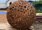 Delicate Corten Steel Carved Hollow Ball Sculpture For Garden Decoration