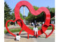 Outdoor Red Heart Sculpture Stainless Steel Contemporary Garden Art Decoration supplier